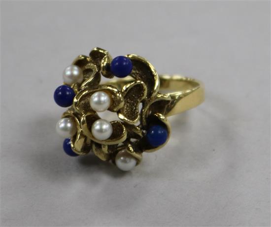 A 1980s? 14ct gold, cultured pearl and lapis lazuli set cocktail ring, size M.